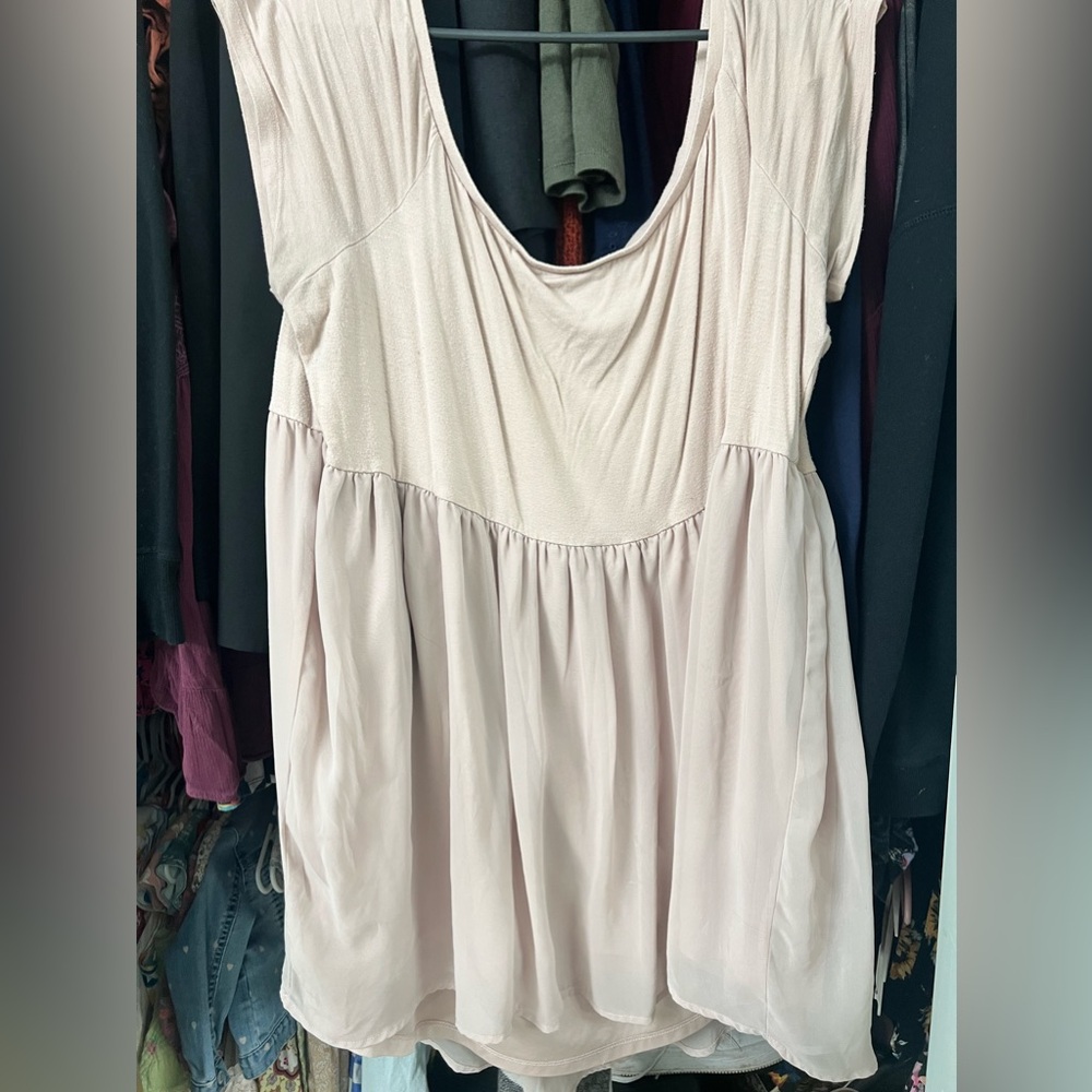 Cream colored top.